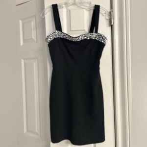 Elegant Black Dress with Silver Bead Accents from DAL M.K.T. Curated Goods